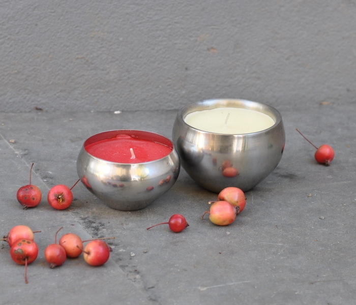 Set of two candles in a stainless steel bowls